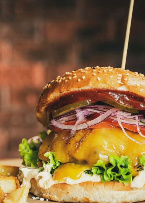 tasty-big-cheese-burger-in-sezame-bun-with-salad-2025-03-24-13-09-44-utc-min